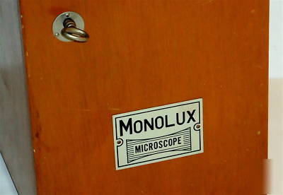 Monolux vintage microscope in wood box w/many extras 