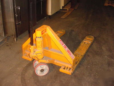 Rol-lift pallet jack for moving heavy machinery 