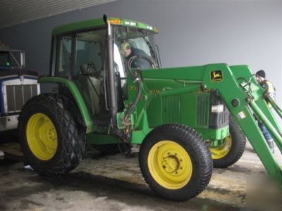 1999 john deere 6200 4WD used to pull a rotary mower
