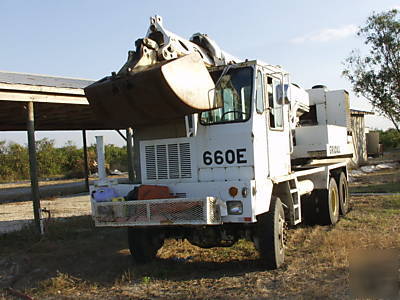 Gradall 660E rubber tire 10 wheel drive excavator bid 