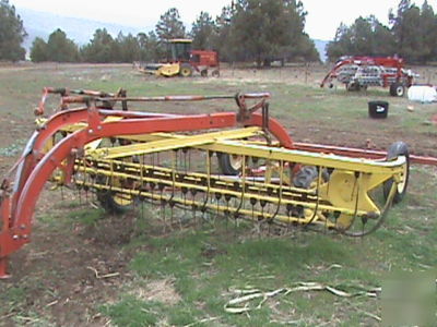New 258/260 holland ground drive tandem hay rakes