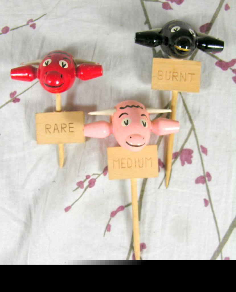 Vintage figural restaurant steak stakes bull figurines