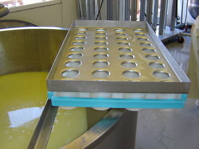 Cheese making equipment for soft cheese multi-moulds