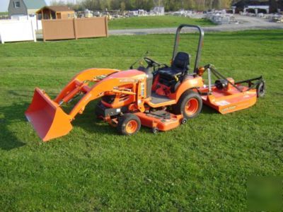 Kubota tractor bx 1850 4X4 loader, mower, bush hog