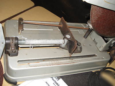 New makita 2414NB portable cut off chop saw & 3 wheels