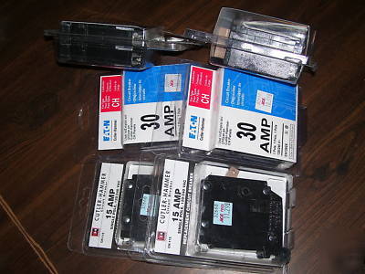 2-2 pole a 20 & 40AMP & 4-1 pole breakers 2-15, 2-40AMP