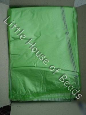 Plastic merchandise retail~50 bags~ lime 8 1/2 X11
