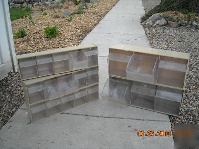 Tilt out storage bins