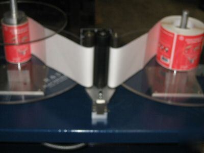 Label rewinder counter inspection machine, labeling
