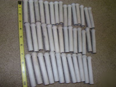 Lot of forty ceramic porcelain insulators spacers