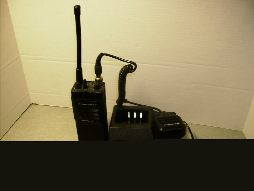 Motorola radius p 100 + drop in battery charger & more 