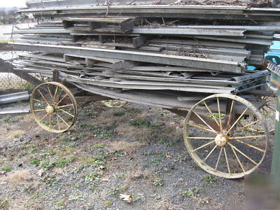 Antique farm wagon, greenhouse & 1969 intl travelall