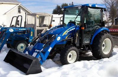 New holland T2320 deluxe cab w/ ac 4WD tractor loader 