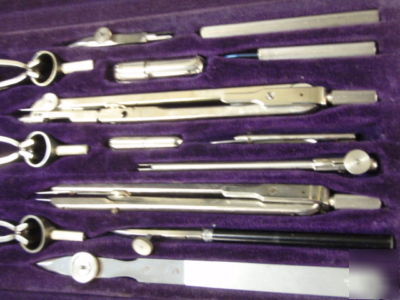 one set of old drafting tools