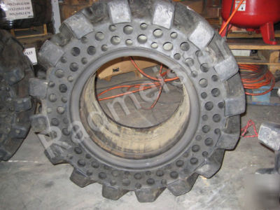 Used flat proof skid steer tire 15