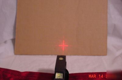 Intellipoint plus projects laser crosshairs or point. 