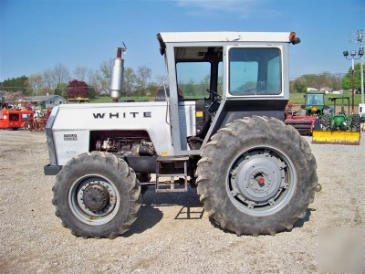Good straight white 2-70 4X4 farm tractor w/ cab diesel