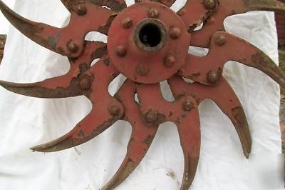 Cast iron red spiral sun shaped tiller blade old ny