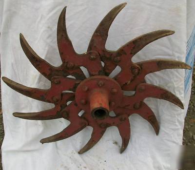 Cast iron red spiral sun shaped tiller blade old ny