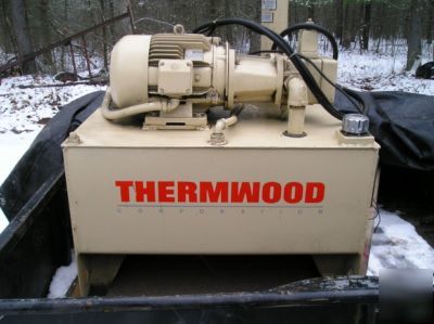 Hydraulic pump motor and reservoir thermwood