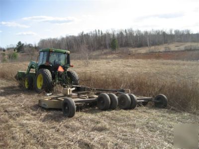 1999 john deere 6200 4WD used to pull a rotary mower