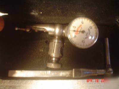 (2) starrett tools, dial indicator # 711 & surface gage