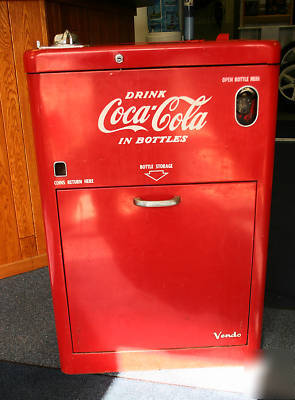 Vendo coke machine a 23 never restore great condition 