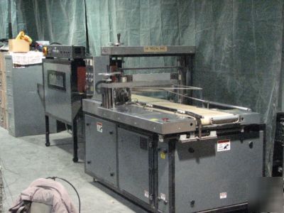 Hitech automatic l bar sealer and shrink tunnel low hrs
