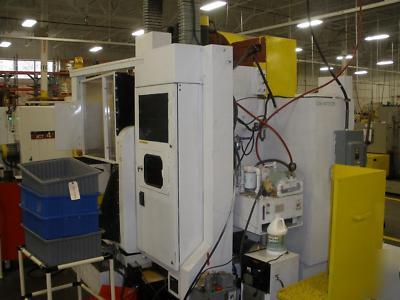 Cnc vertical machining center okuma howa 4 va reduced