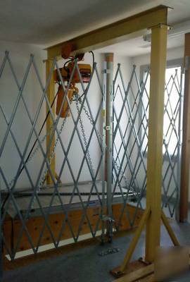 Harrington electric hoist, ramp, chain, & security gate