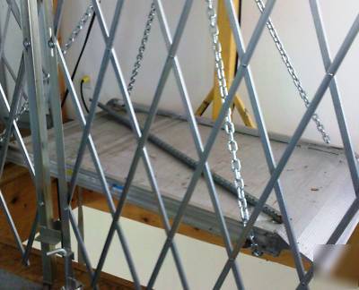 Harrington electric hoist, ramp, chain, & security gate