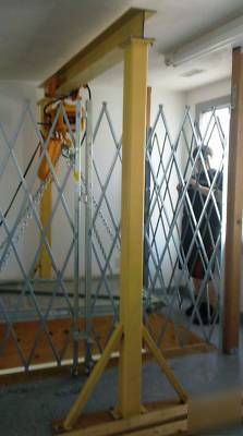 Harrington electric hoist, ramp, chain, & security gate