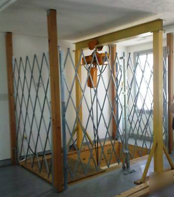 Harrington electric hoist, ramp, chain, & security gate