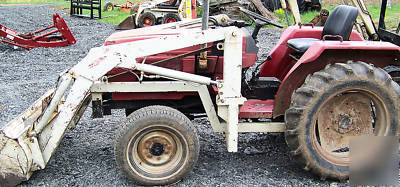 International 244 4X4 compact diesel tractor loader 