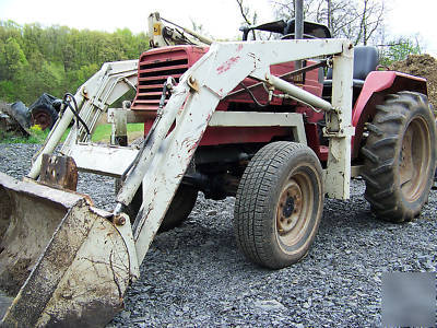 International 244 4X4 compact diesel tractor loader 