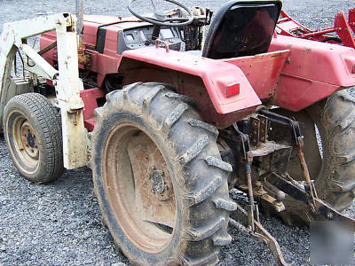 International 244 4X4 compact diesel tractor loader 