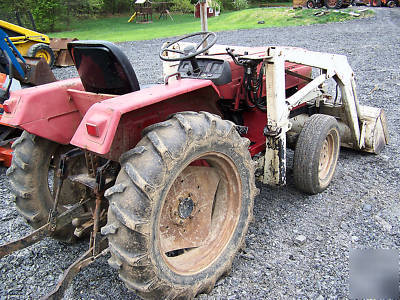 International 244 4X4 compact diesel tractor loader 