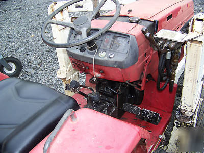 International 244 4X4 compact diesel tractor loader 