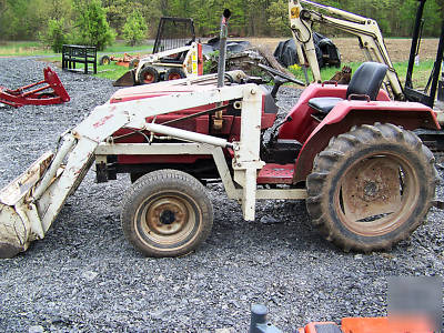 International 244 4X4 compact diesel tractor loader 