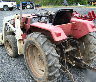 International 244 4X4 compact diesel tractor loader 