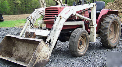 International 244 4X4 compact diesel tractor loader 