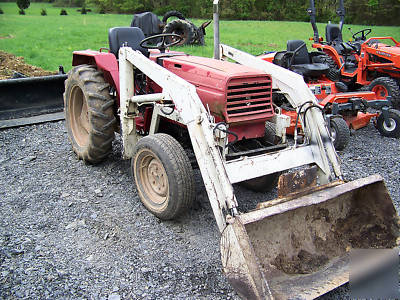 International 244 4X4 compact diesel tractor loader 