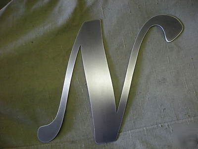 10 inch tall metal script bold letters. 11 ga steel. 