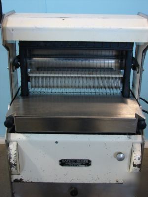 Oliver 777 bread slicer on cart with bag holder, 5/8