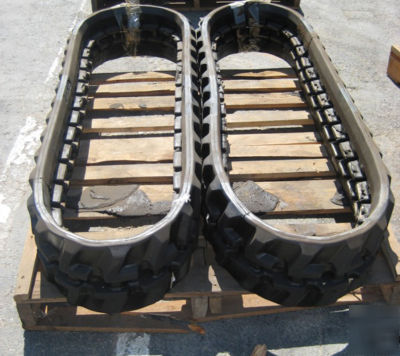 A set of 2 rubber tracks takeuchi TB016 mini excavator