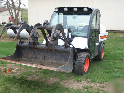 Bobcat toolcat 300 hours 7 attachment package deal 