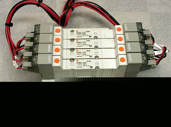 4 smc SY3000 solenoid pneumatic air valves + manifold