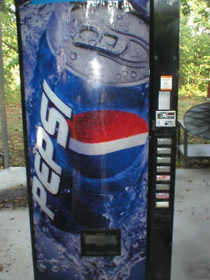 Dixie narco 440 multi-price soda vending machine..