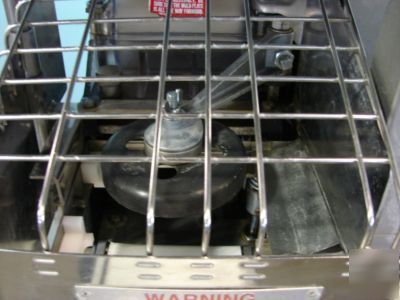 Hollymatic super 54 patty forming machine with conveyor