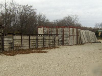 Used durand smooth/textured concrete wall forms w/truck